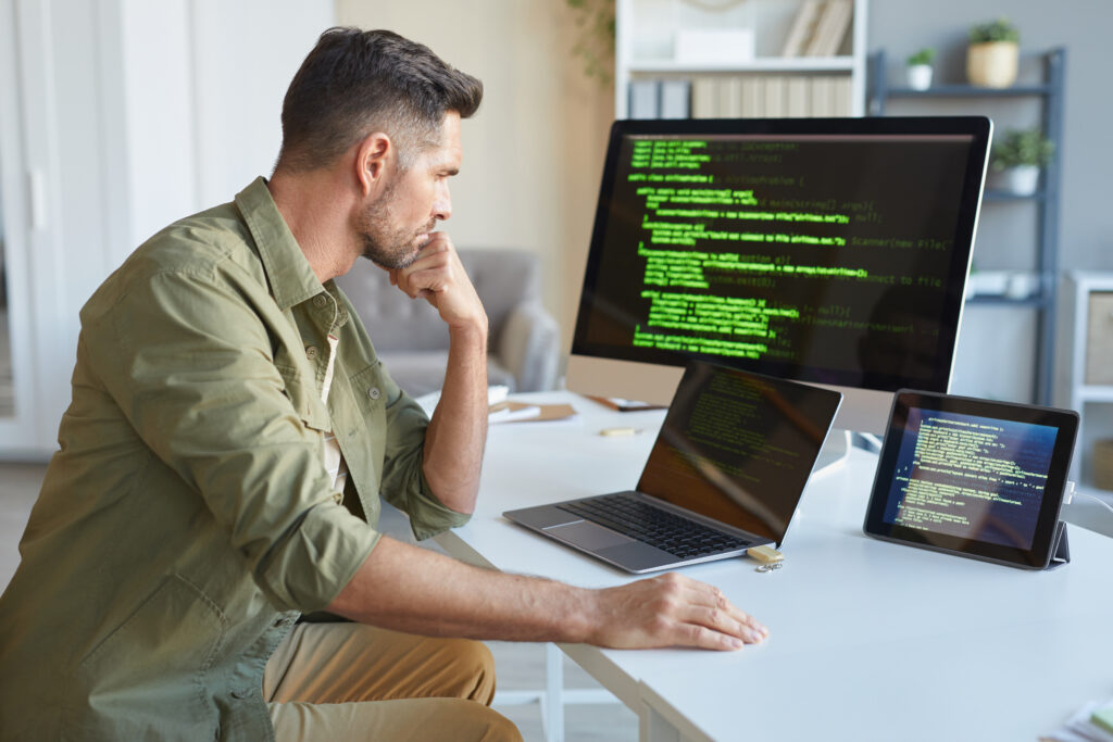 Computer technician installing software